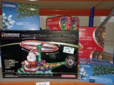 NEW BOXED 12 X MIXED CHRISTMAS LOT, INCLUDING MOTION LED SANTA HELICOPTER SILHOUETTE, LED FAIRY