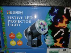 4 X NEW BOXED FESTIVE LED PROJECTOR LIGHT WALL MOUNTABLE, SOUND ACTIVATION, VARIABLE SPEED CONTROL -