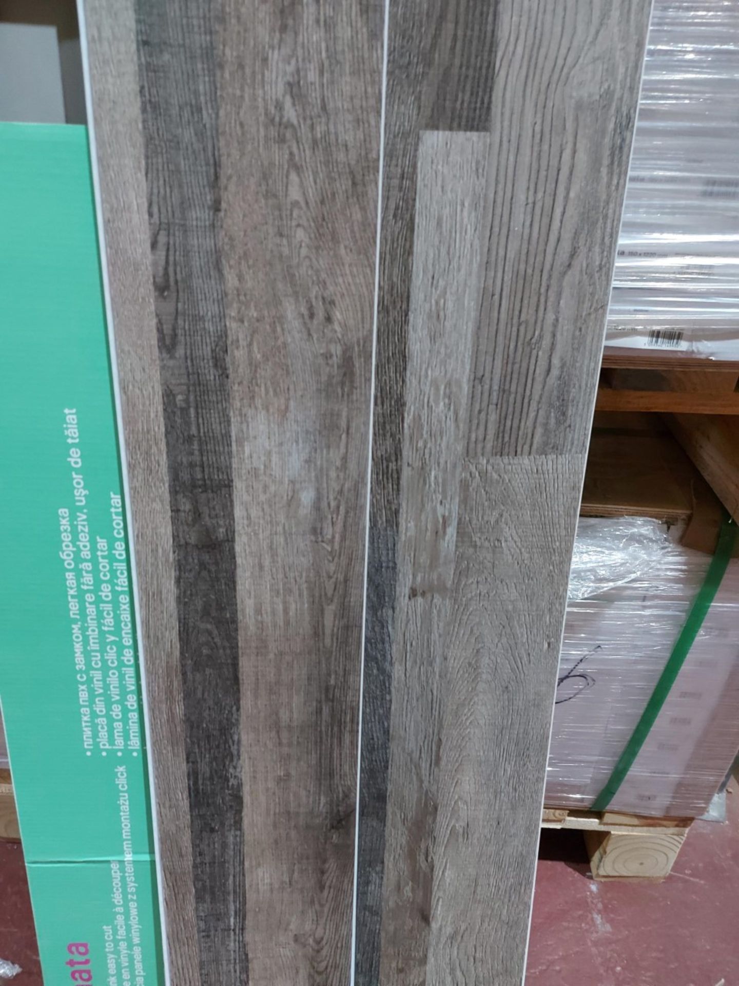 PALLET TO CONTAIN 138.24m2 OF BACHETA LUXURY VINYL CLICK PLANK FLOORING. MULTI-PLANKS BROWN. EASY TO