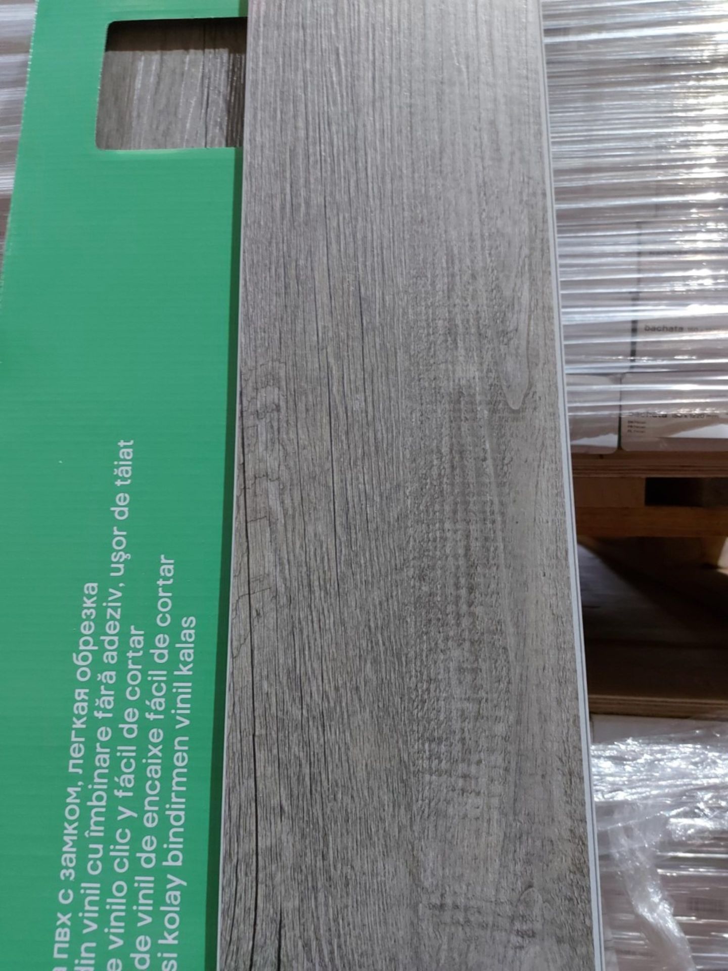 PALLET TO CONTAIN 138.24m2 OF BACHETA LUXURY VINYL CLICK PLANK FLOORING. PECAN. EASY TO CUT. 3.2MM