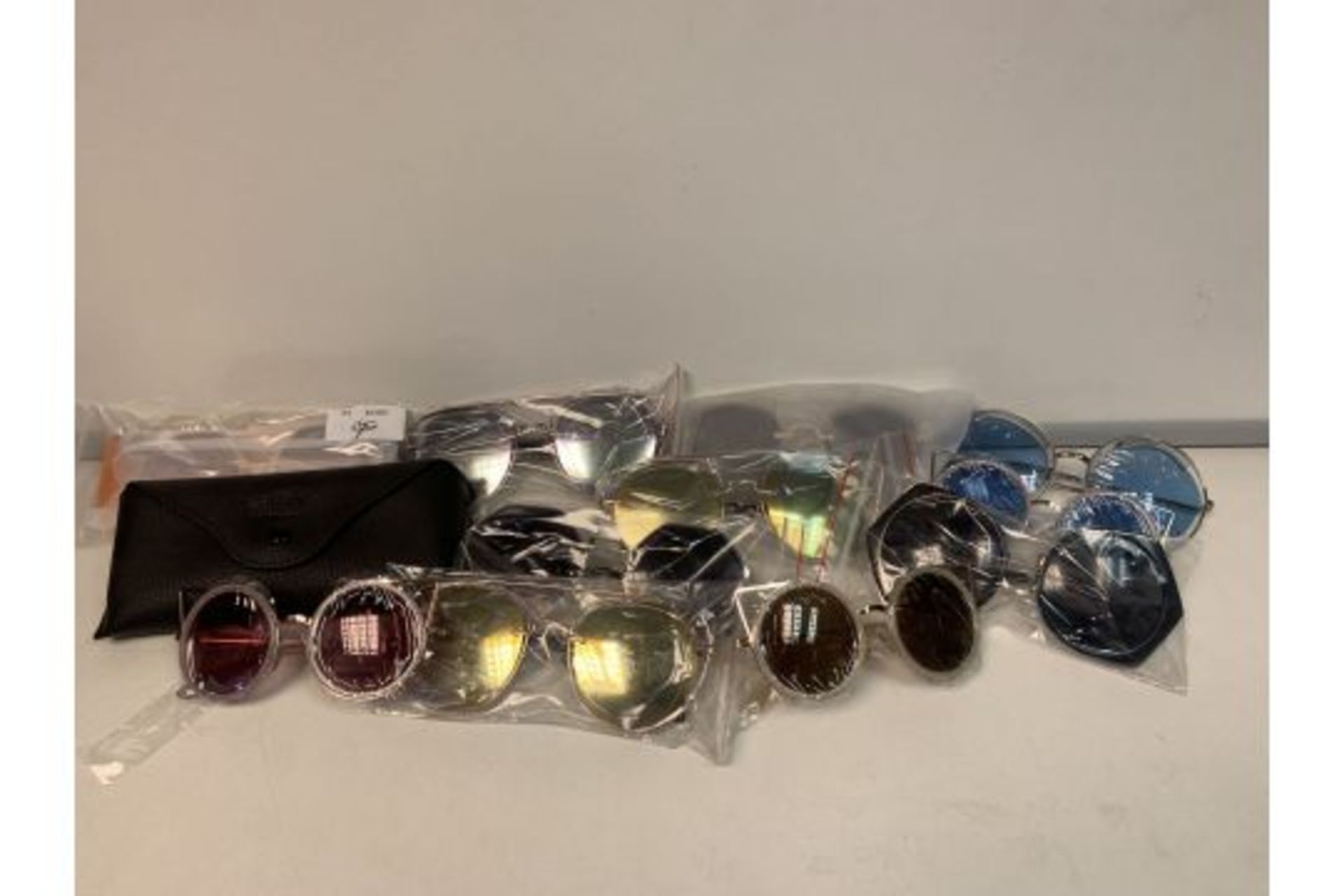 40 X NEW PACKAGED PAIRS OF SHADES SUN GLASSES WITH CASES IN ASSORTED DESIGNS (ROW1/2)