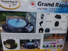 BOXED GRAND RAPIDS INFLATABLE 110-JET 4-PERSON HOT TUB. RRP £899. UNCHECKED/UNTESTED