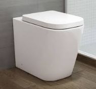 New Florence Rimless Back To Wall Toilet Inc Luxury Soft Close Seat. Rimless Design Makes It Easy To