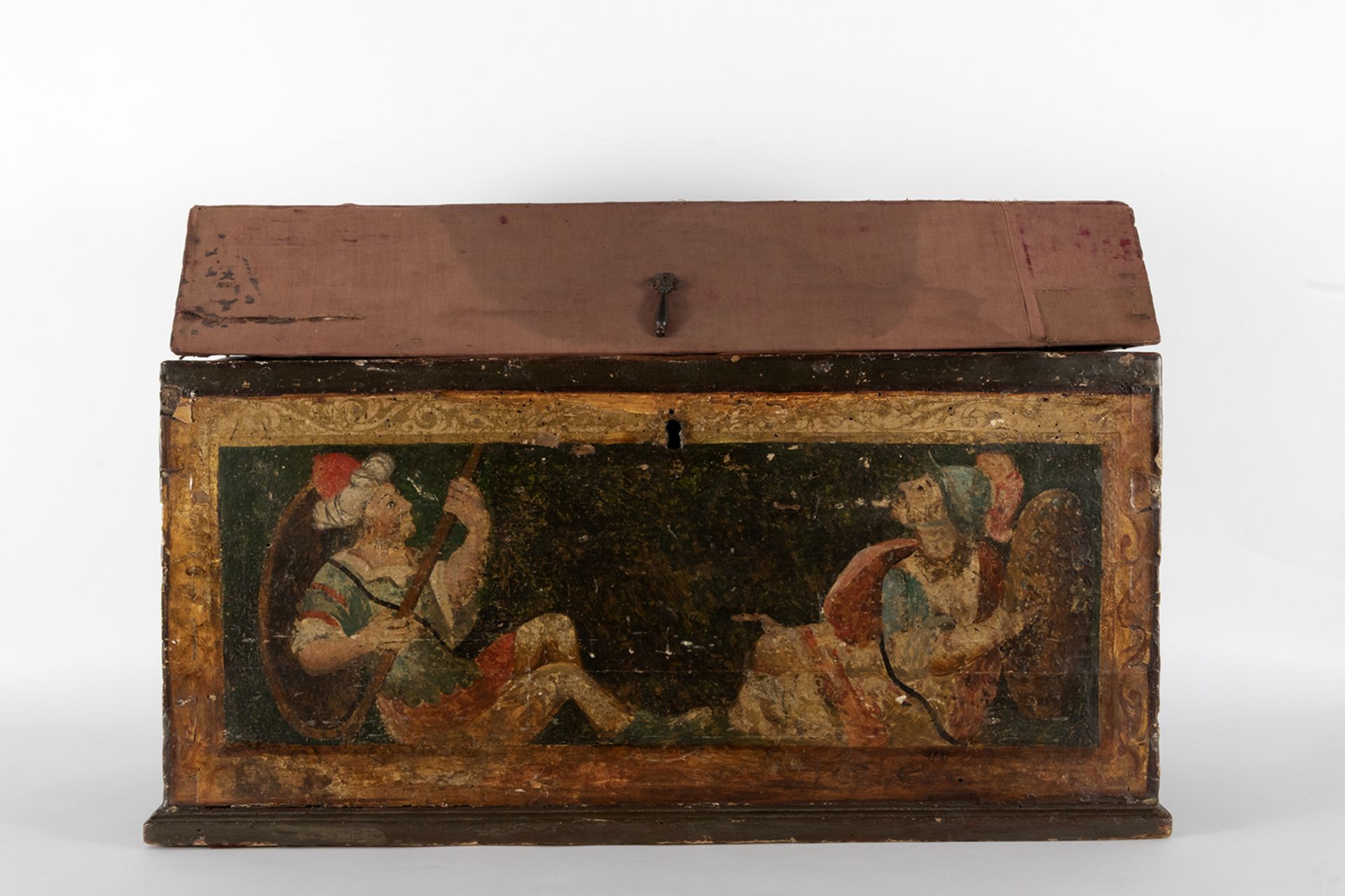 Ark with gabled lid in carved and polychrome wood with decoration of a Roman and Turkish soldier.