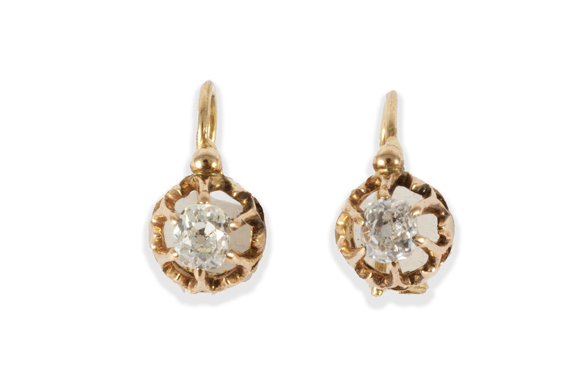 Antique brilliant cut diamond and gold earrings.