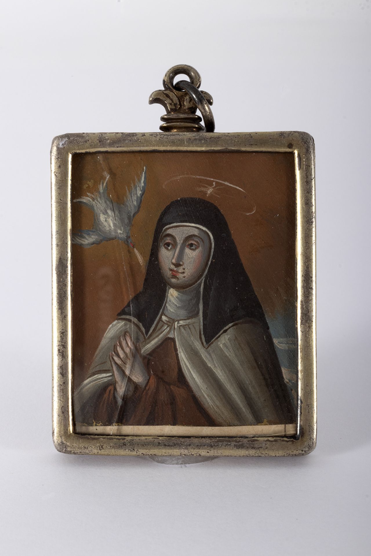 Reliquary with silver frame.