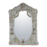 Wall mirror in carved ivory.