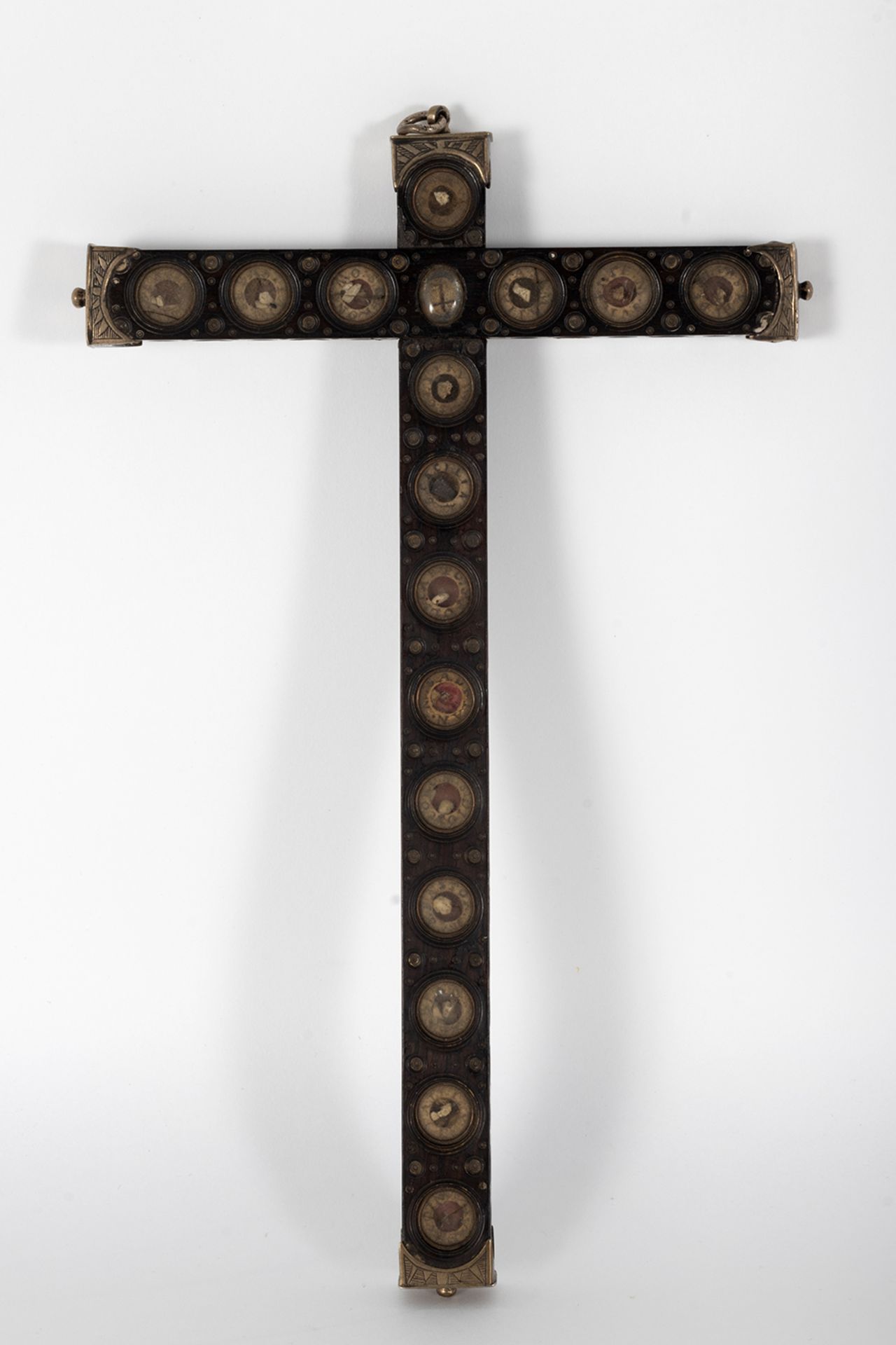 Spanish Colonial reliquary cross in wood with viriles housing relics and silver finishes. Mexico, 18