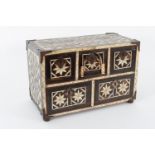 Colonial chest in wood, bone and tortoiseshell with geometric decoration and five drawers.