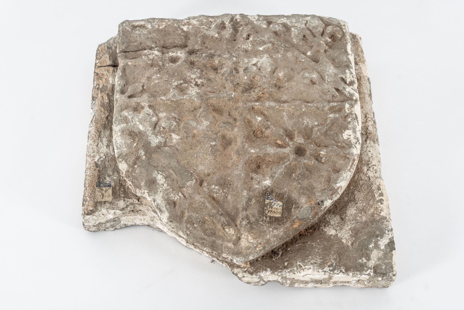 Sculpted limestone shield, 15th century. 