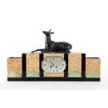 Art Deco tabletop clock with a pair of calamine, marble and onyx cauldrons with representation of a