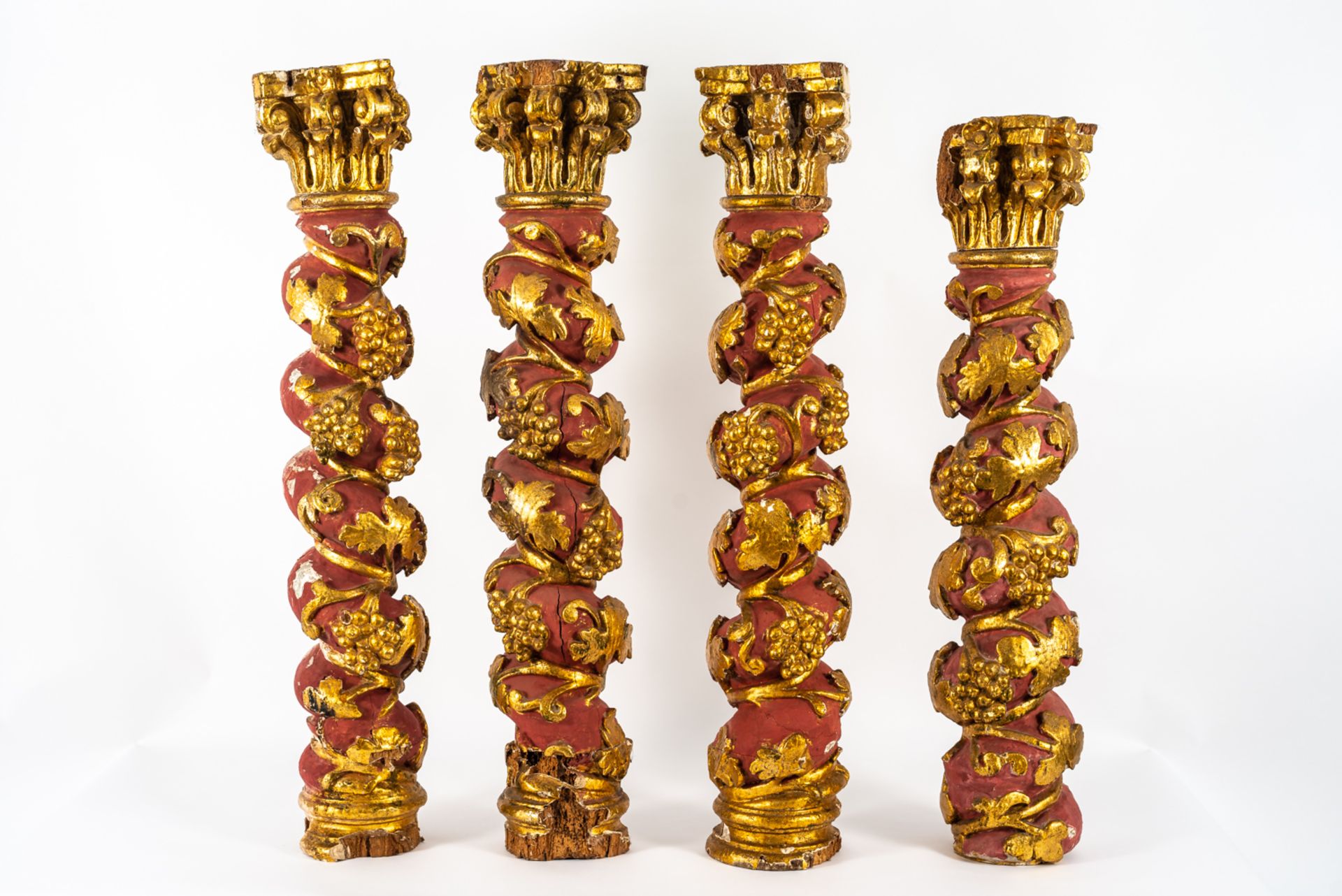 four solomonic columns in carved, polychrome and gilded wood, 18th century.