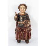 Spanish school at the end of the 15th century. Seated Infant Jesus. Polychrome wood carving.