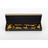 Versace fountain pen in faceted black resin with fretwork decoration on the central ring and gold-pl