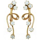 Gold and diamonds earrings.