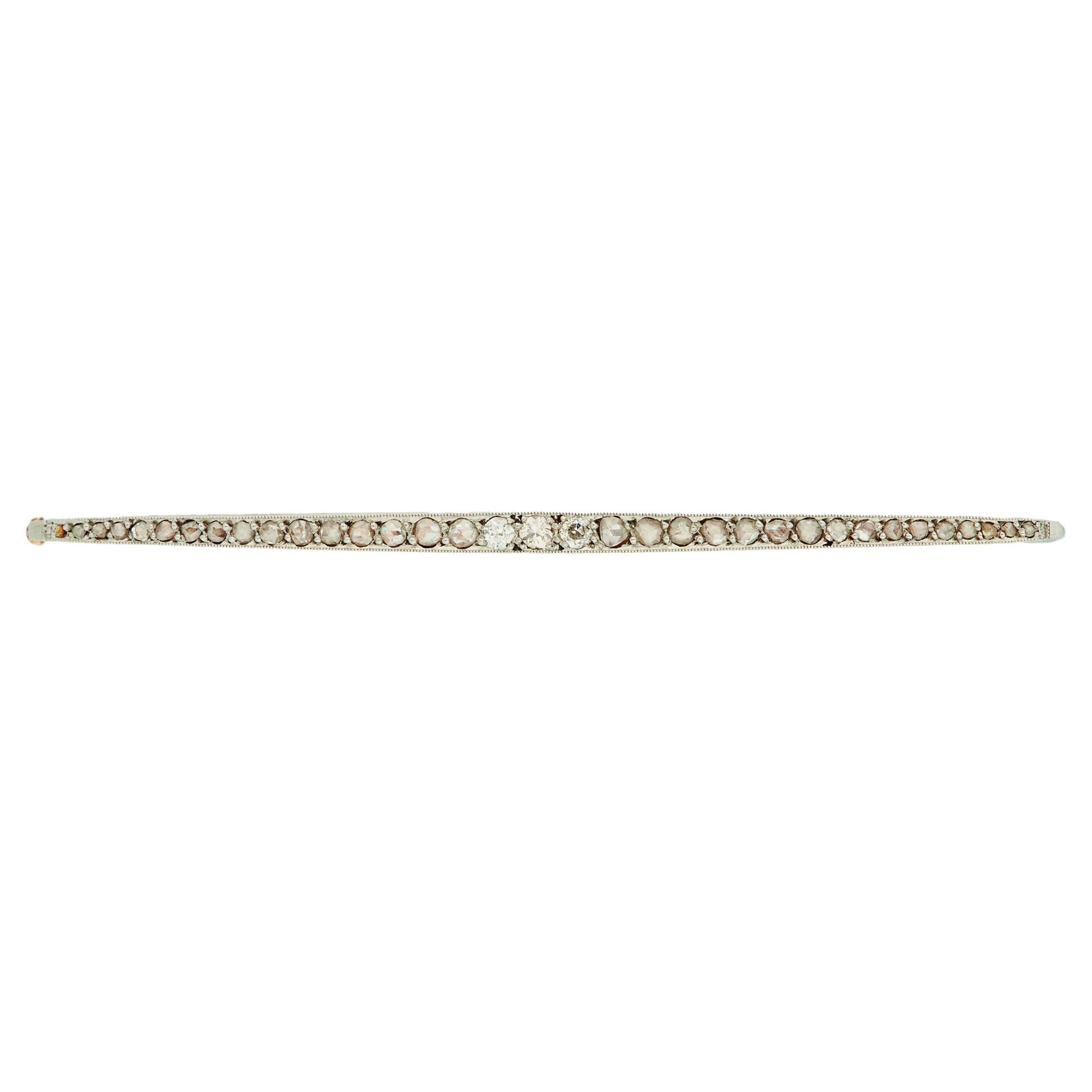 Art deco gold, platinum and diamonds needle brooch, c.1930.