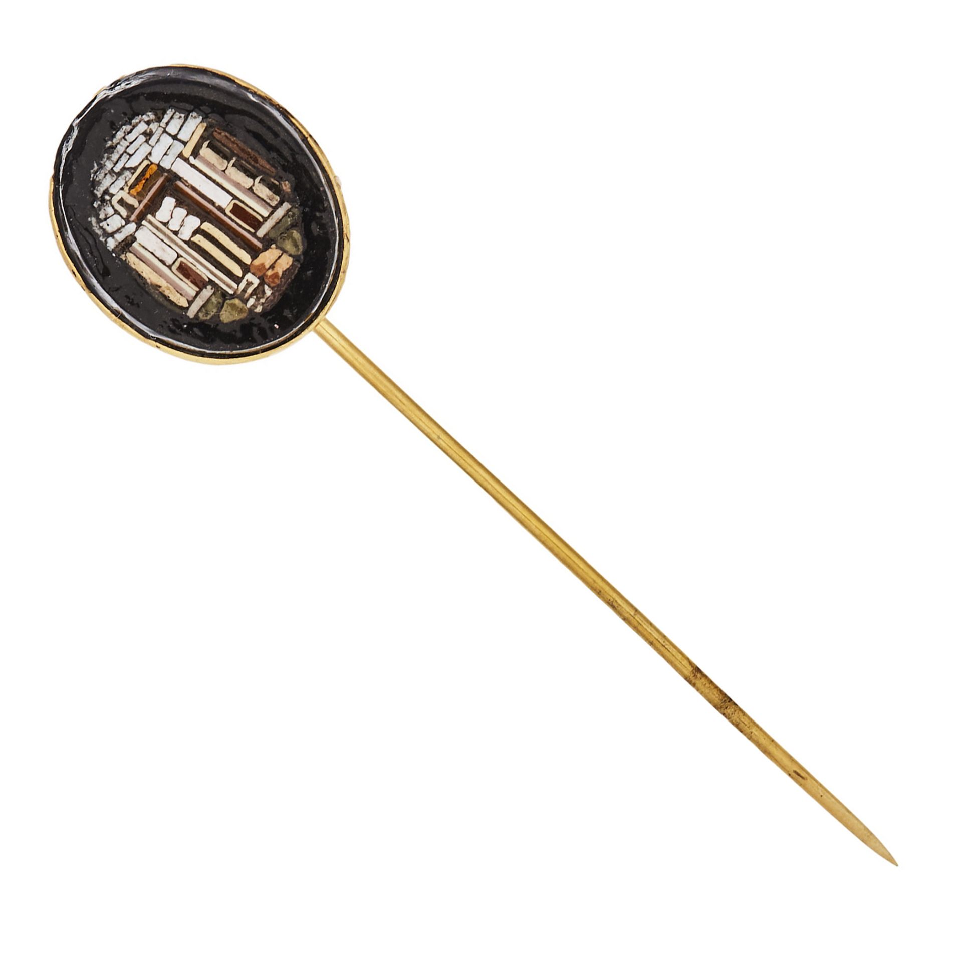 Gold and onyx needle brooch.