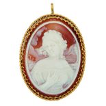 Gold, cameo and bisque pendant brooch.
