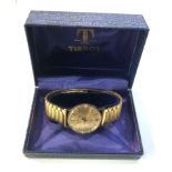 Boxed 9ct gold gents Tissot seastar seven wristwatch in working order and good condition but no