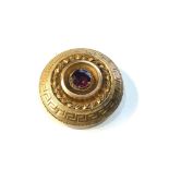 High carat gold gem set brooch picture locket back measures approx 3.6cm dia weight 12.8g acid