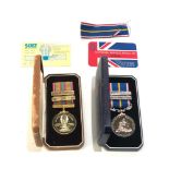 2 boxed medals inc suiez campaign and national service medals