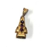 Antique high carat gold garnet set pendant measures approx 3.8cm drop by 1.5cm wide xrt tested 18t