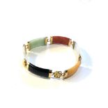 Chinese 14ct gold and coloured jade panel bracelet measures approx 18cm by 1.2cm weight18.5g