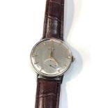 Vintage oversize Omega gents wristwatch silvered dial gold coloured batons case measures approx 34mm