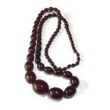 cherry amber /bakelite type bead necklace no internal streaking weight 95g