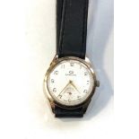 Vintage 9ct gold gents Garrard wristwatch winds and ticks in good used condition but no warranty