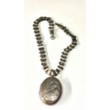 Antique silver locket and collar age related wear marks and dents locket measures approx 7cm drop by