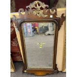 Georgian mahogany framed hall mirror with a gilt bird set in the top measures approx 36" tall by 15"