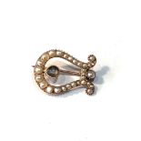 Antique gold seed-pearl and crystal brooch measures approx 2.4cm by 1.7cm weight 2.8g