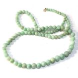 Vintage original jade jadeite bead necklace measures approx 65 cm long with gold clasp largest