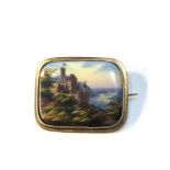 Gold framed scenic painted ceramic panel brooch measures approx 4.2cm by 3.4cm xrt tested as 12ct