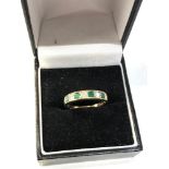 18ct gold diamond and emerald half eternity ring 2.8g