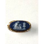 Small gold framed cameo brooch measures approx 2.3cm by 1.2cm