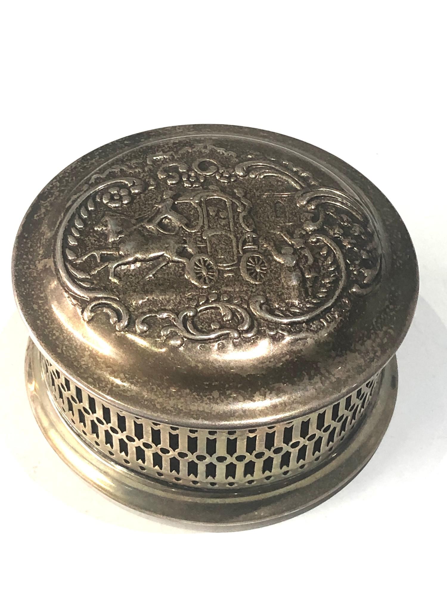 Vintage silver pierced scenic embossed lid jewellery box measures approx 10cm dia height 5.7cm