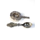 2 continental silver items includes dutch silver tea strainer and commemorative spoon weight 80