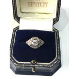 18ct & plat art deco old cut diamond ring central diamond measures approx 6mm with rose diamonds