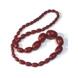 Antique cherry anmber / bakelite bead necklace largest bead measures approx 29mm by 21mm weight