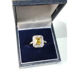 18ct white gold yellow sapphire and diamond ring central sapphire measures approx 7mm by 6mm with