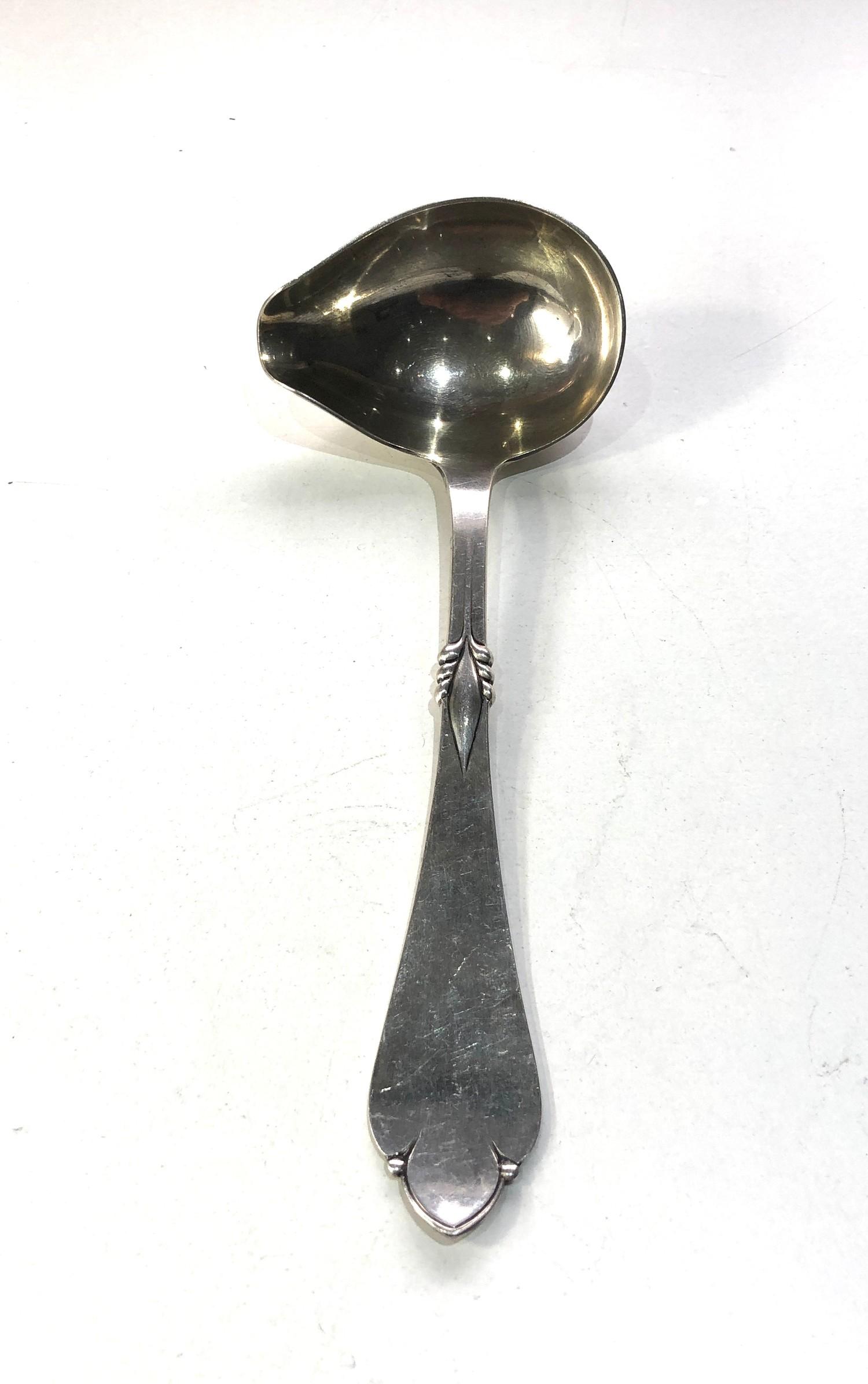 Antique silver continental sauce ladle measures approx 18cm by 7cm wide weight 56g