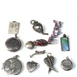 Selection of vintage silver jewellery includes lockets pendants etc