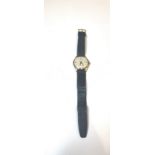 Vintage mens 9ct Garrard wristwatch, leather strap, manual wind movement, inscribed British road