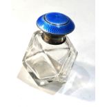 Antique silver and enamel top perfume bottle measures approx height 8cm complete with stopper