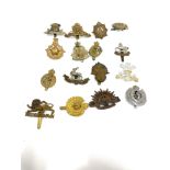 16 Military cap badges including WW1, WW2, Army, Dental cor, Royal Warwickshire, Australian etc