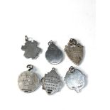 Selection of silver pocket watch chain fobs