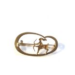 14ct gold and diamond brooch measures approx 4cm by 2.2cm set with 2 diamonds weight 4.1g hallmarked