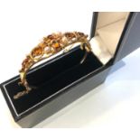 Fine 9ct gold pearl and gem set bangle in good condition weight 17.3g measures approx 6.1cm by 5.6cm